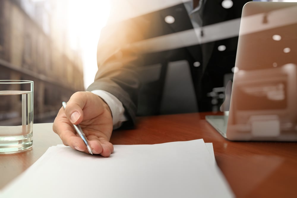 double exposure of businessman or salesman handing over a contract on wooden desk-2